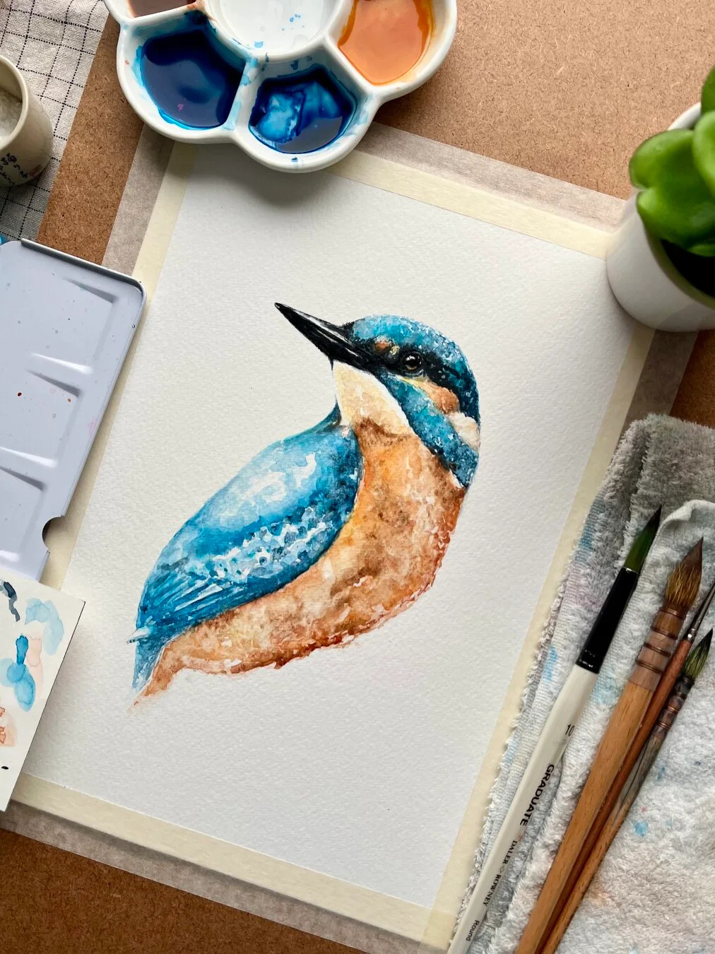 The majestic kingfisher in watercolours. 🕊️ Watch the relaxing, painting process now: https://youtu.be/ymw_49usI_4 #watercolor #aquarelle #art #painting #relaxing #paintwithme #artwork #windsorandnewton #watercolorpainting #watercolourpainting #watercolour #natureart #birds #birdart #birdpainting #aquarelleart #illustration #kingfisher #relaxingart #kingfisherart #comminkingfisher #natureart